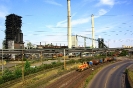 ThyssenKrupp Lok 854 vor der Kokerei Schwelgern mit leeren Torpedepfannenwagen auf dem Rückweg zu den Hochöfen Schwelgern.(27.7.2019)